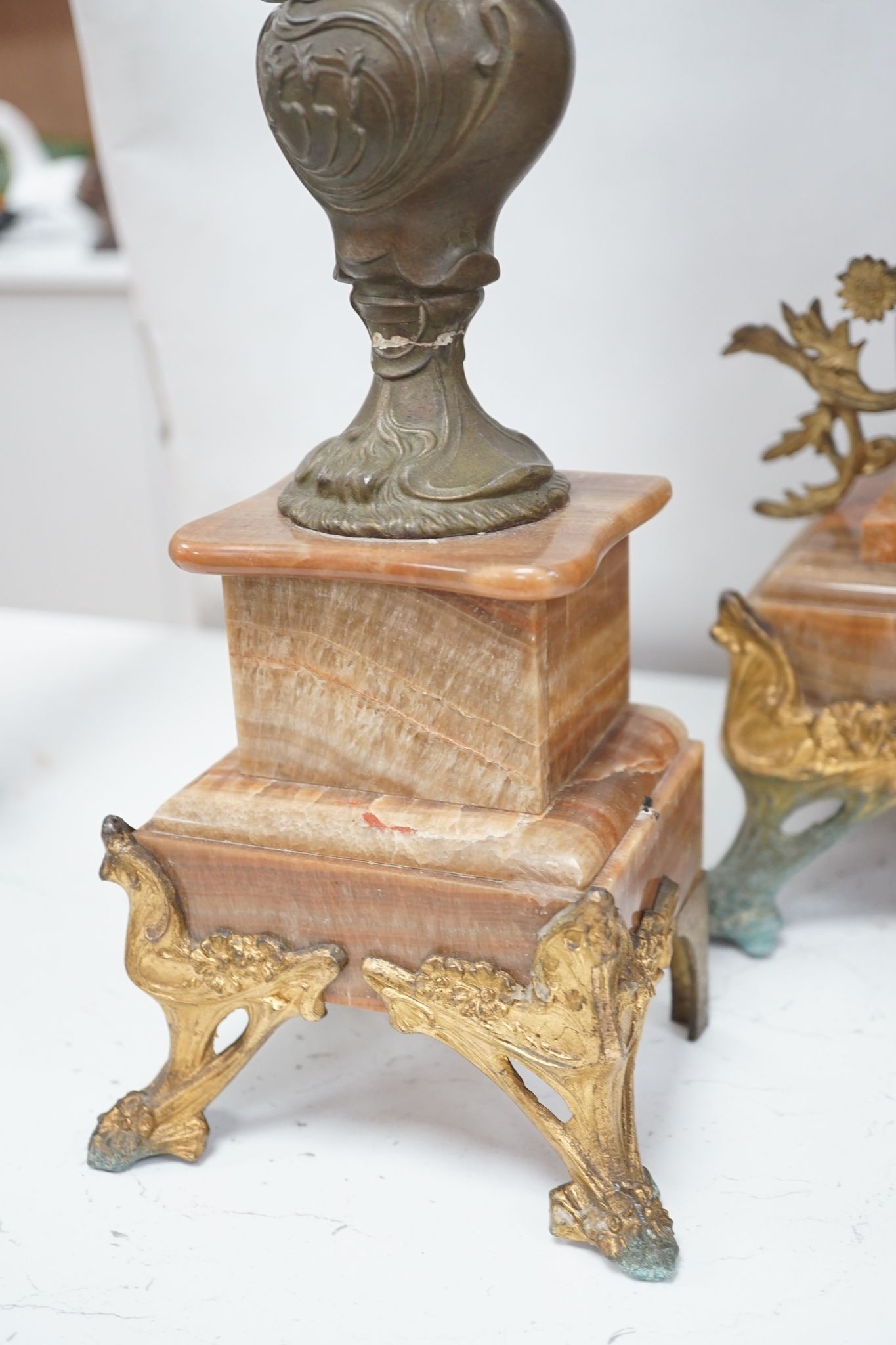 A French onyx and spelter figural clock garniture 66cm